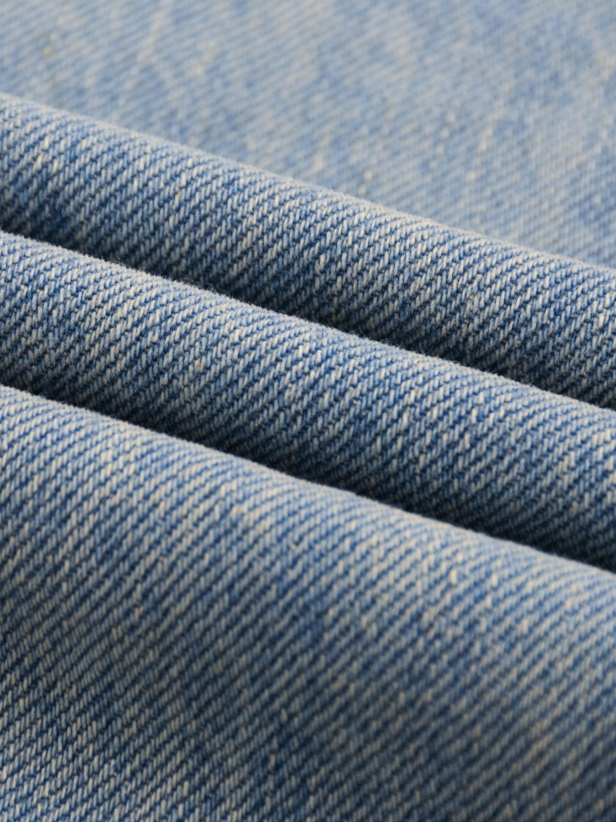 THE DESERT FRONTEIR SUN FADED RAW HEM DENIM JEANS